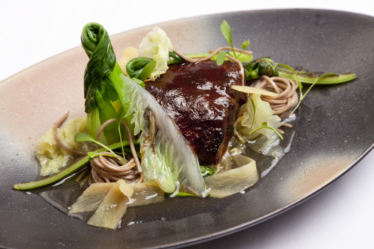 Miso-marinated Alaska black cod, soba noodles and green tea broth