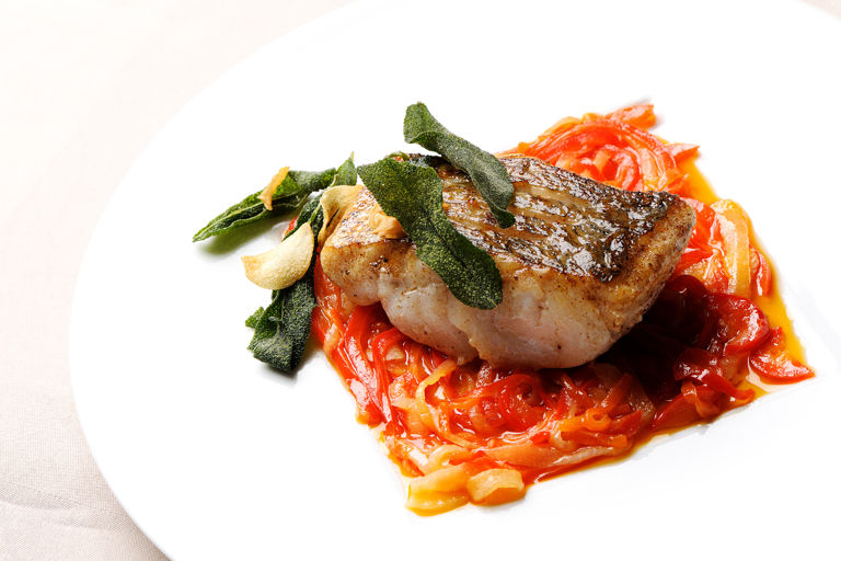 Pan-fried hake with red pepper relish