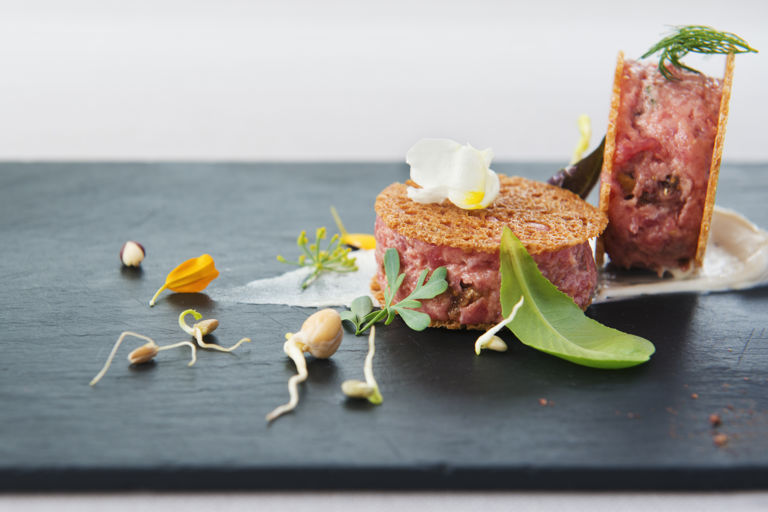 Veal tartare with figs, hazelnuts and anchovy butter