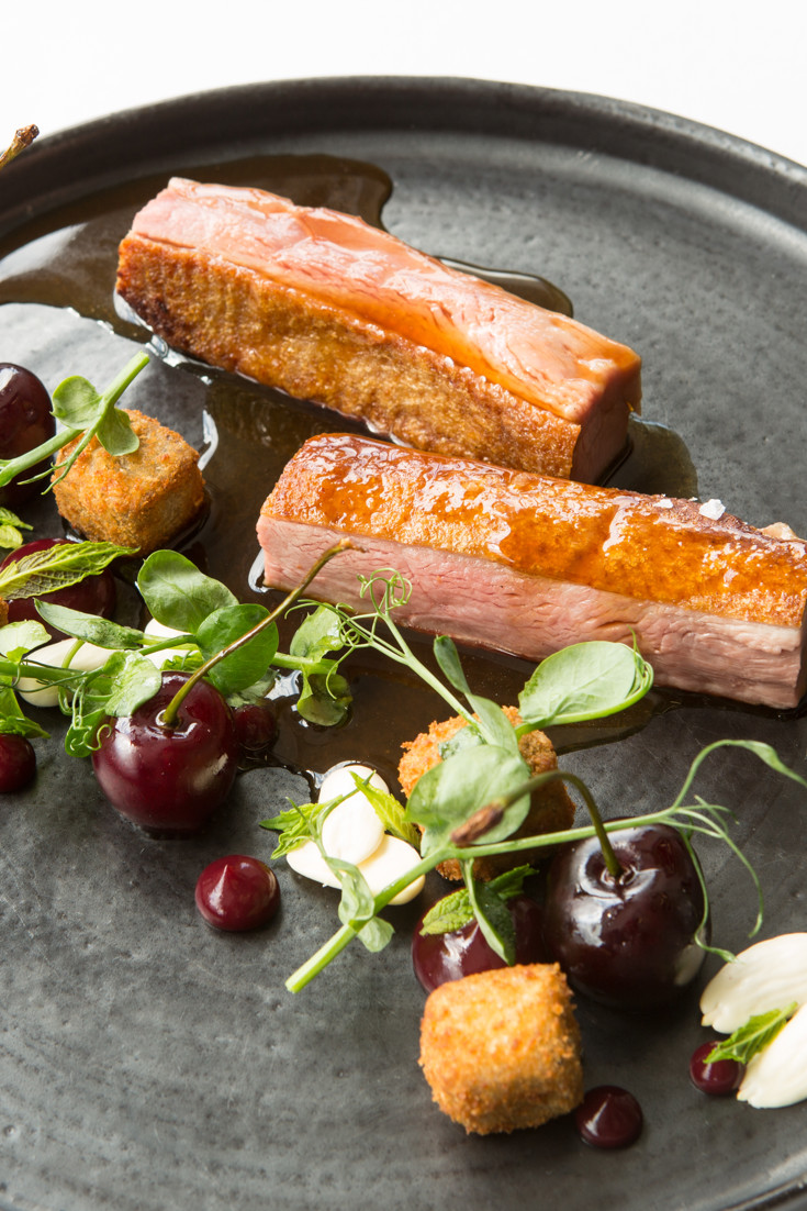 Crispy Duck Breast and Leg with Cherries Recipe - Great British Chefs