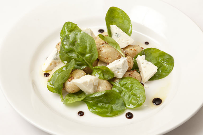 Baby spinach and new potato salad with melted Gorgonzola