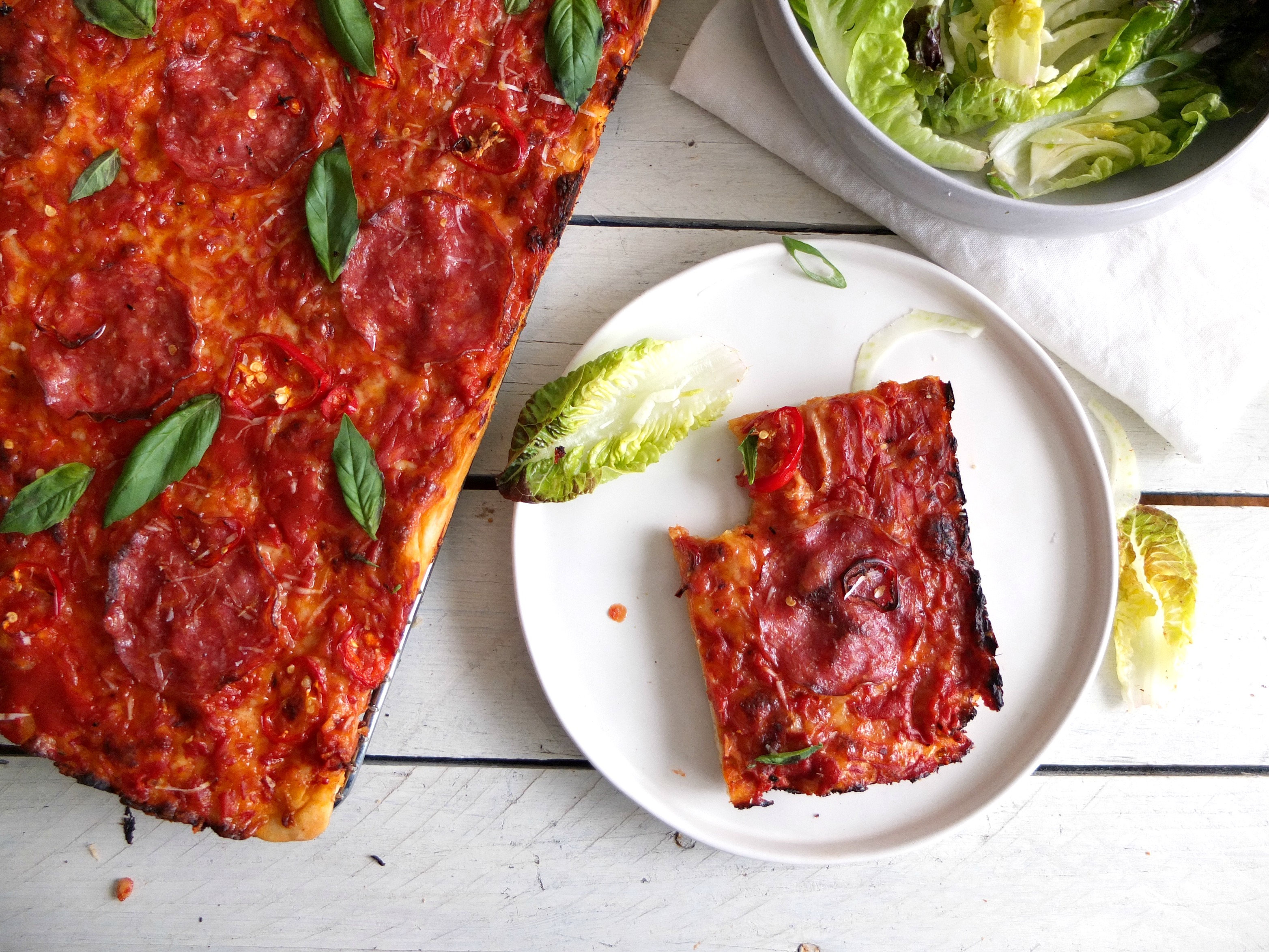 Sicilian Pizza Topped with Tomatoes and Onions