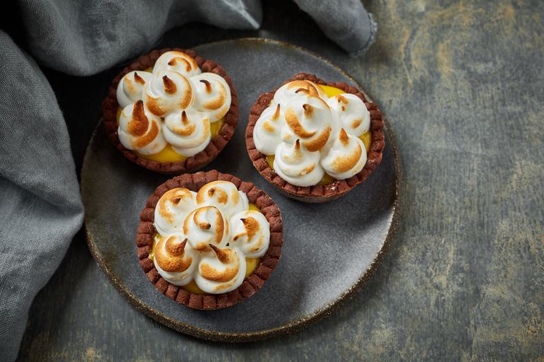 Gluten-free passionfruit and chocolate meringue tartlets