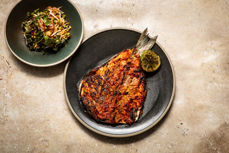 Roasted sea bass with durian sambal and snake bean and pomelo salad