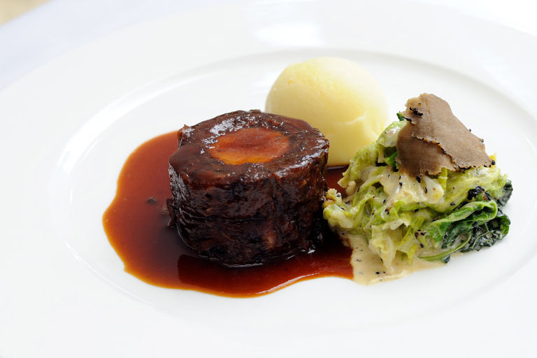 Oxtail with boudin blanc and creamed cabbage