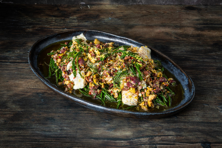 Pan-seared sea bass with citrus-olive salsa and samphire