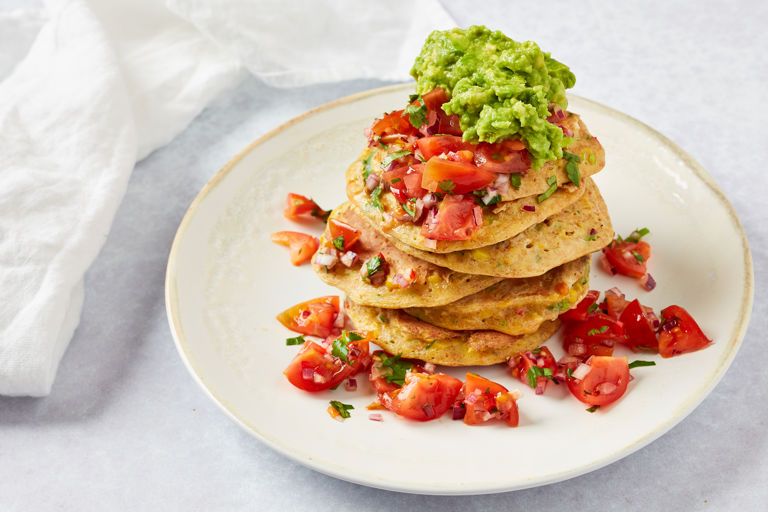 Spelt and sweetcorn pancakes with avocado and salsa