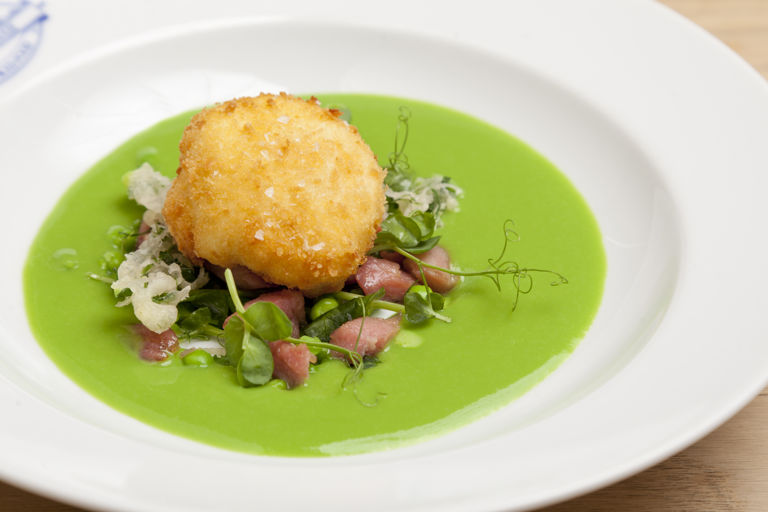 Pea and honey-roasted gammon salad with pea soup and crispy egg
