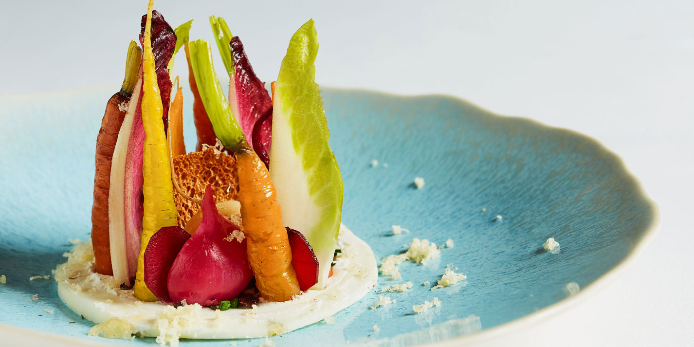 Salad of autumn vegetables with goat's curd and cobnuts