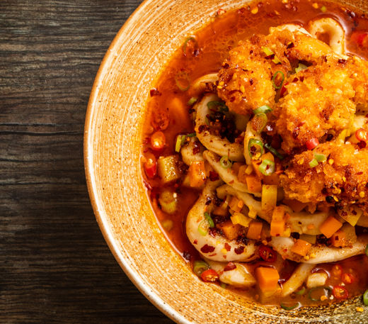 ‘Firecracker’ soup curry udon with crispy prawns