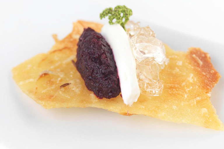 Elderflower jelly with beetroot relish, goat cheese and a caraway tuile