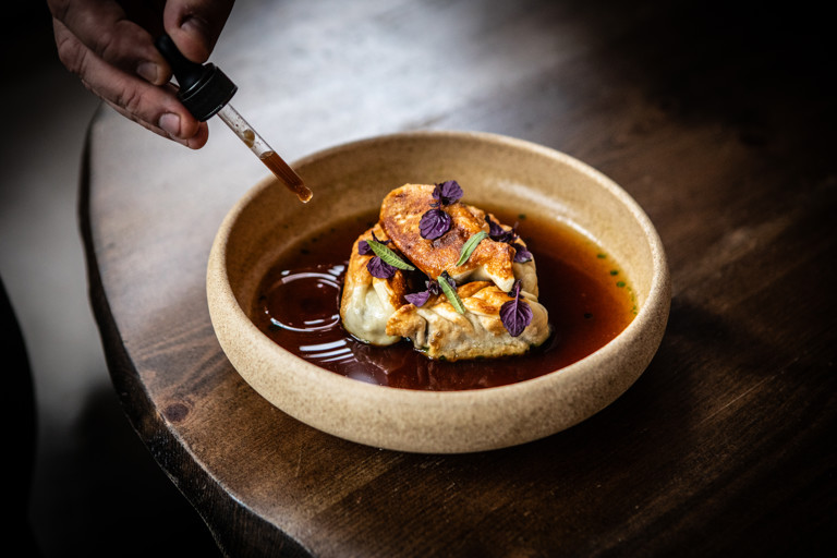 Beef cheek dumplings with oxtail broth and smoked shallot mayonnaise