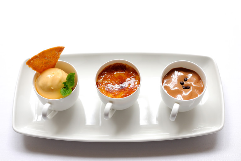 Tonka bean crème brûlée with apricot sorbet and chocolate emulsion