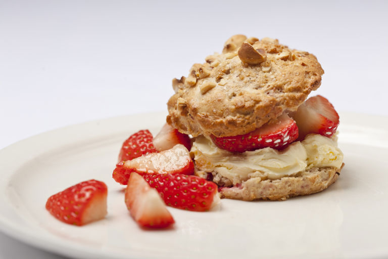 Hazelnut and tonka bean scones with strawberries and clotted cream