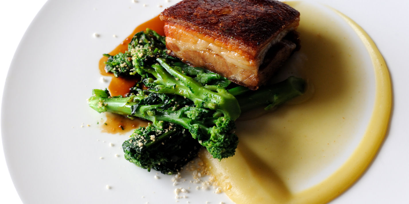 Pork belly with apple purée and sprouting broccoli