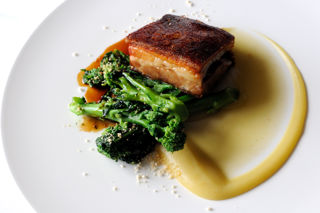 Pork belly with apple purée and sprouting broccoli