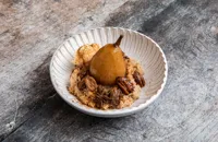 Rice pudding with rum poached pears, cinnamon and caramelised pecans