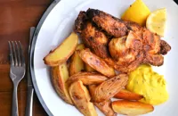 Deep-fried poussin with tarragon mayonnaise and potato wedges