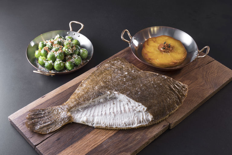 Whole roasted brill with sprouts and potato galette