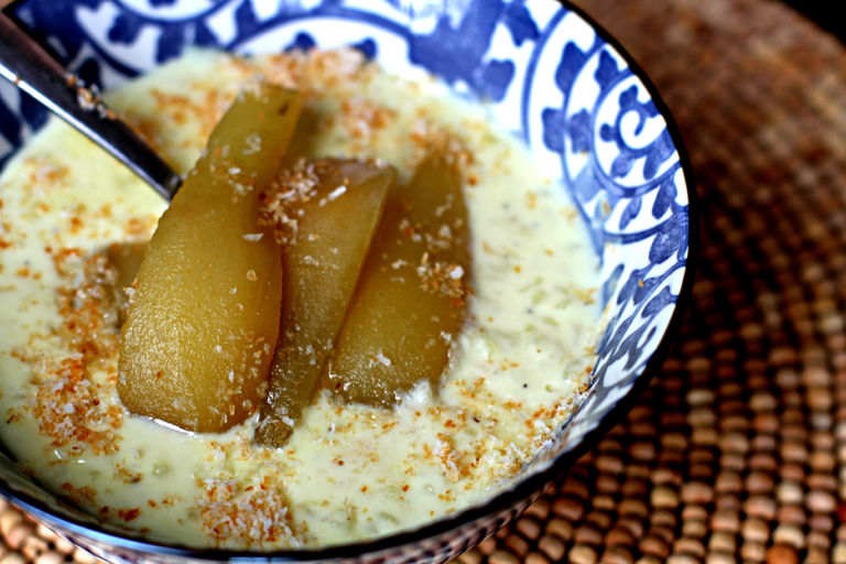 Indian-spiced coconut rice pudding with aromatic poached pears