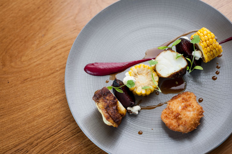 Vindaloo-spiced monkfish with sweetcorn and beetroot