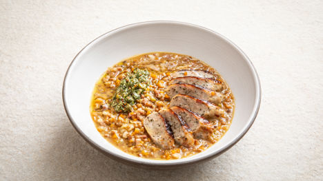 Sausages and lentils with mustard green sauce