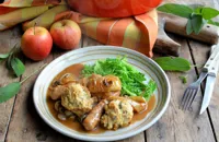 Sausage and apple casserole with herb-crusted dumplings