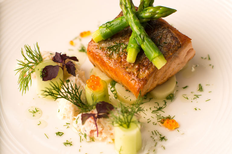 Pan-roasted fillet of salmon with marinated Jersey Royals and dill and crab salad