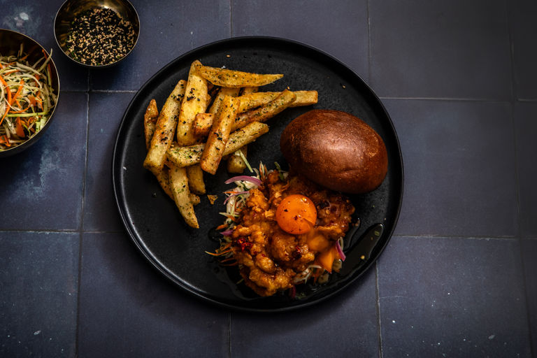 Buttermilk Fried Chicken Sandwich with Hot Honey Cured Egg Yolk and Furikake Chips 