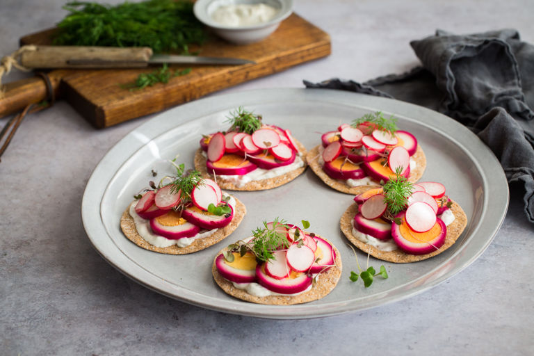Sourdough crispbreads with beetroot pickled eggs and dill and caper yoghurt 