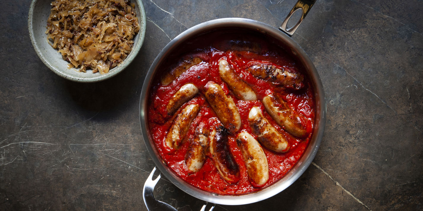 Lamb Sausages in Tomato Sauce with Bacon Sauerkraut Recipe - Great British Chefs