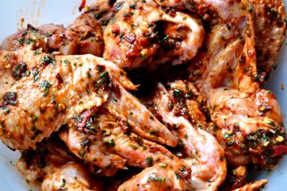 When wings are coated, cover and leave in the fridge