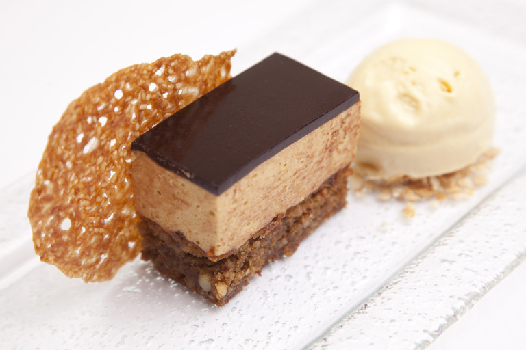 Hazelnut, caramel and sesame mousse cake with malt ice cream