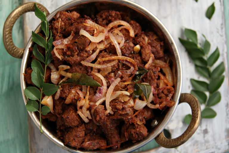 South Indian spiced beef with pink onions