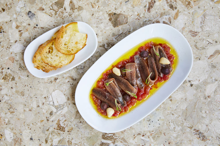 Anchoas del Cantábrico with tomato and olive oil