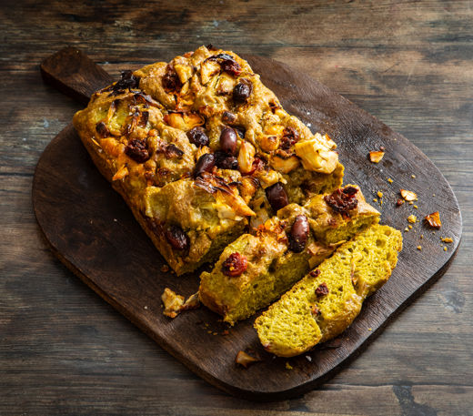 Spinach and artichoke focaccia with black olives and chorizo