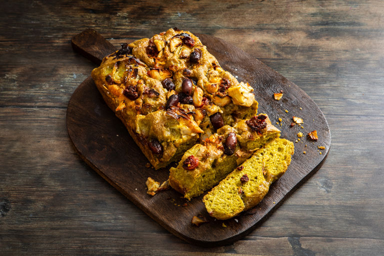 Spinach and artichoke focaccia with black olives and chorizo