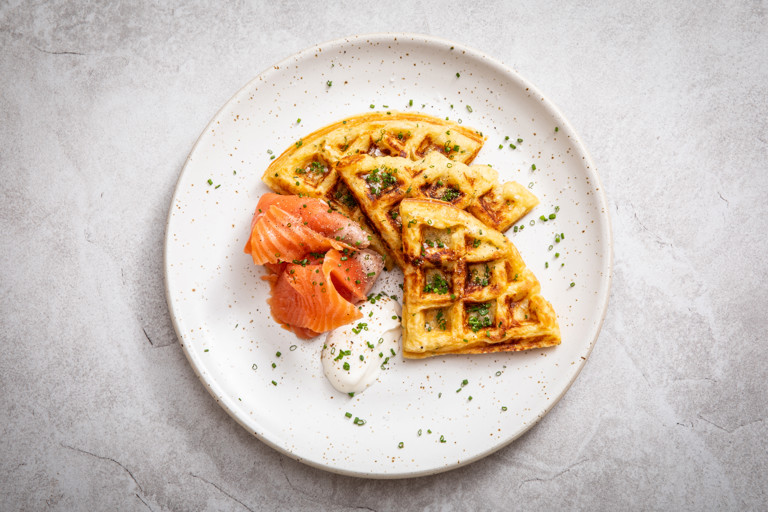 Sour cream and chive potato waffles with smoked trout