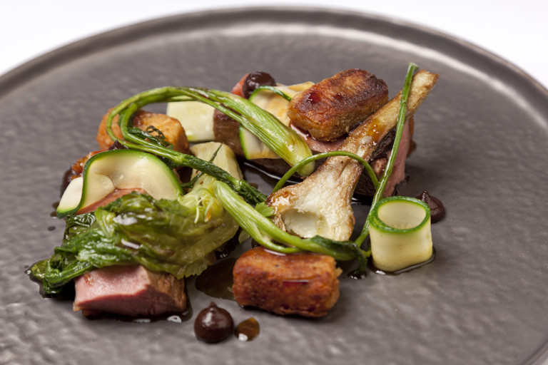 Cannon of Welsh Lamb with black olive, tomato and courgette
