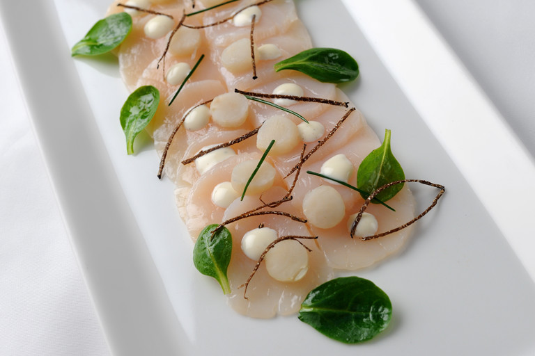 Carpaccio of hand dived scallops with truffle vinaigrette
