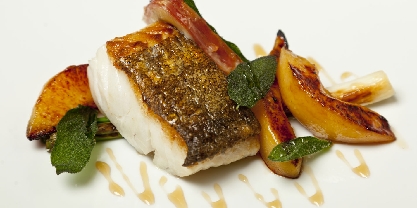 Roast cod with morcilla, quince and calçots 