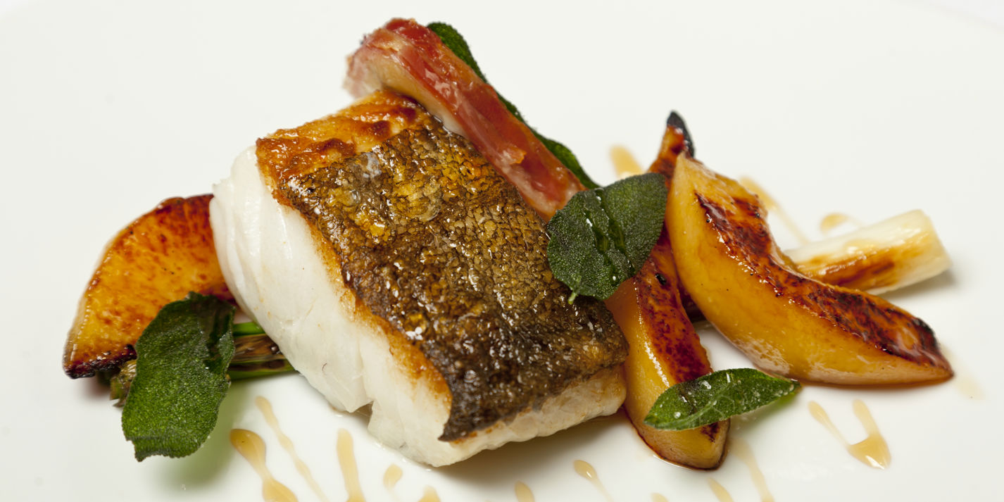 Roast cod with morcilla, quince and calçots 