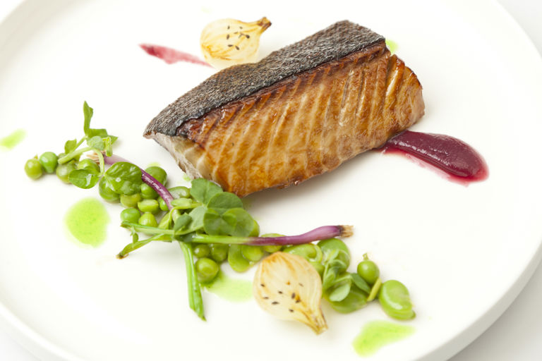Alaska black cod with red onion jam, peas and broad beans