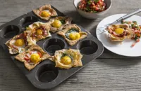 Egg cups with a spicy tomato salsa