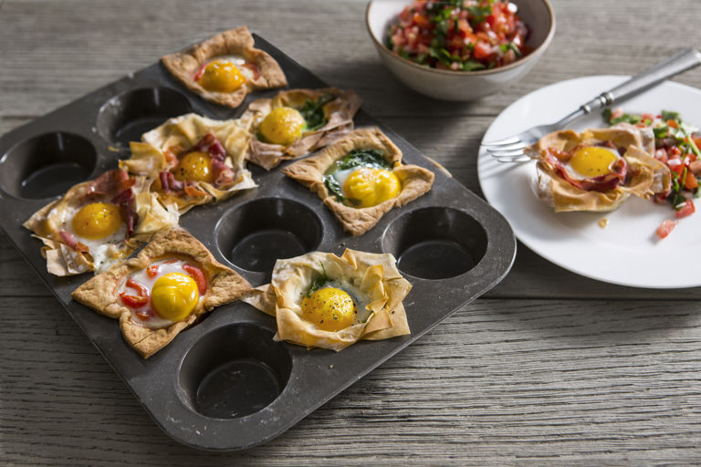 Egg cups with a spicy tomato salsa