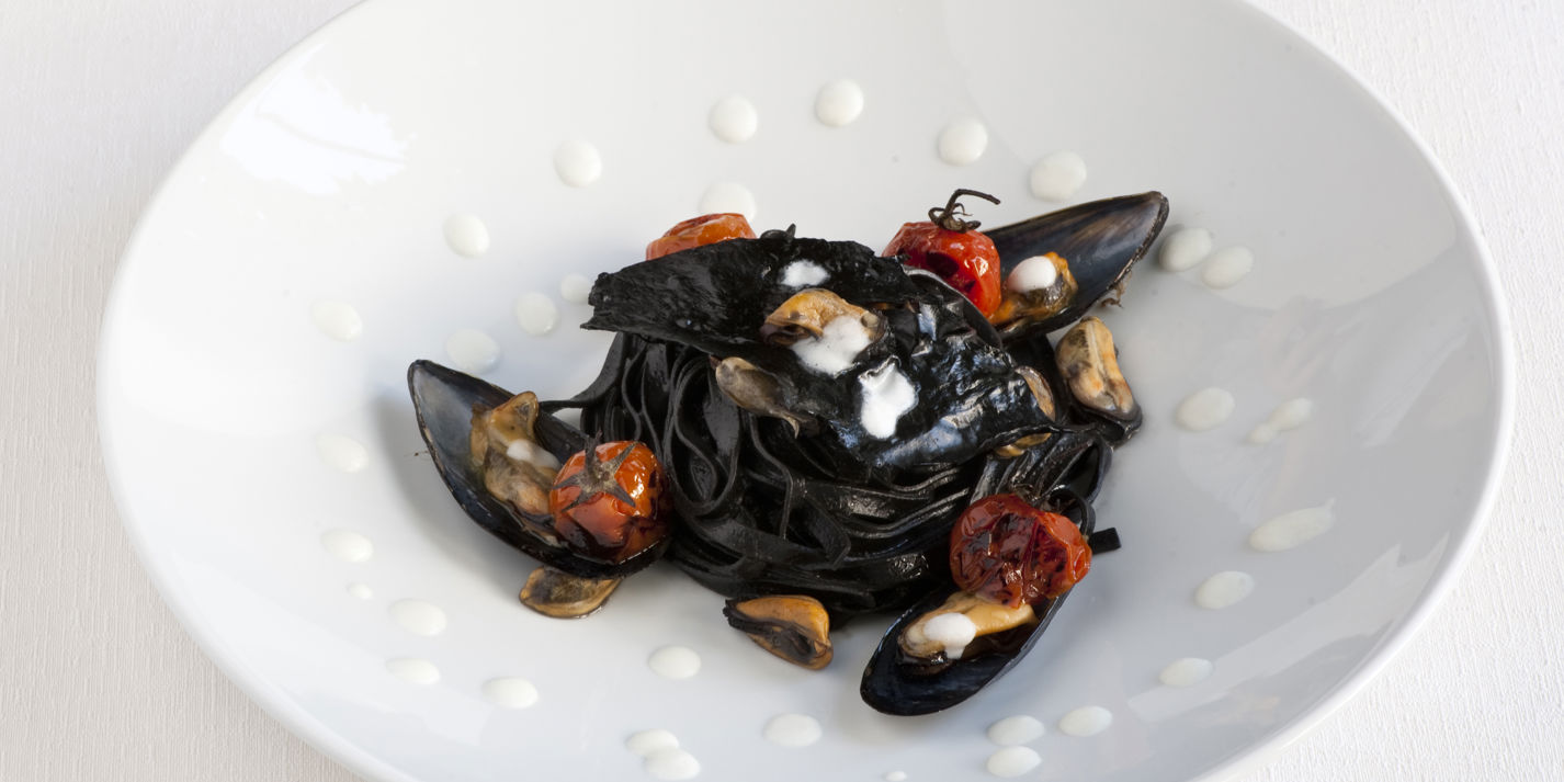 Soup with mussels and mozzarella milk