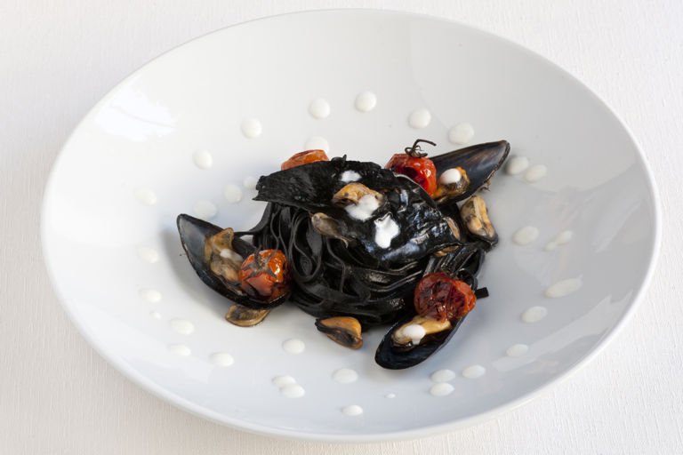 Soup with mussels and mozzarella milk