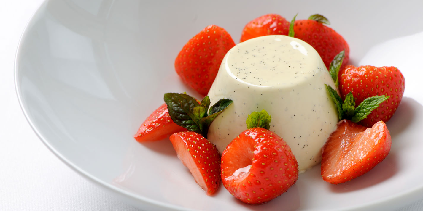 Vanilla panna cotta with strawberries and Grappa