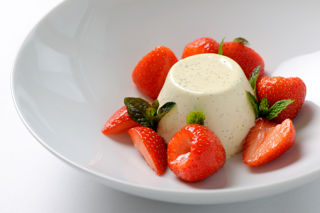 Vanilla panna cotta with strawberries and Grappa