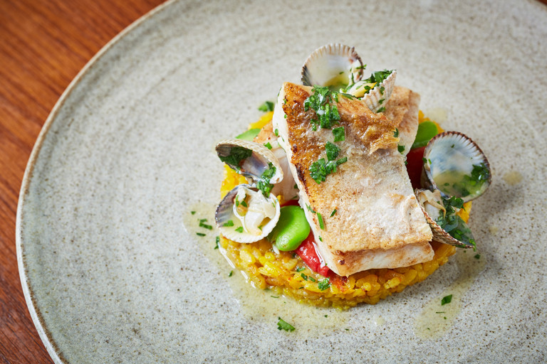 Gurnard with paella rice and clams